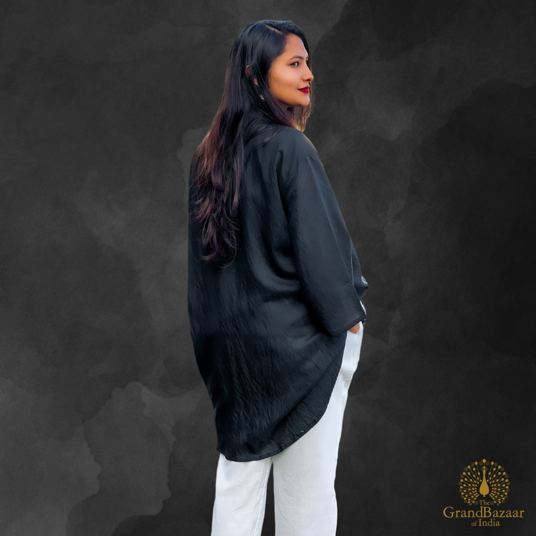 Black kurti and white pants and floral embroidery