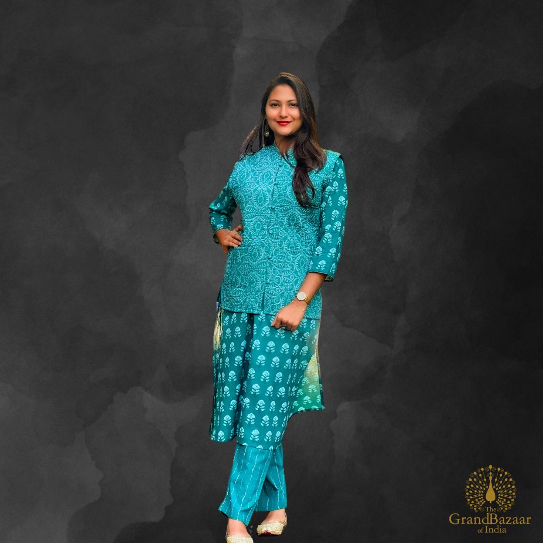 Green kurti set with block prints and a jacket